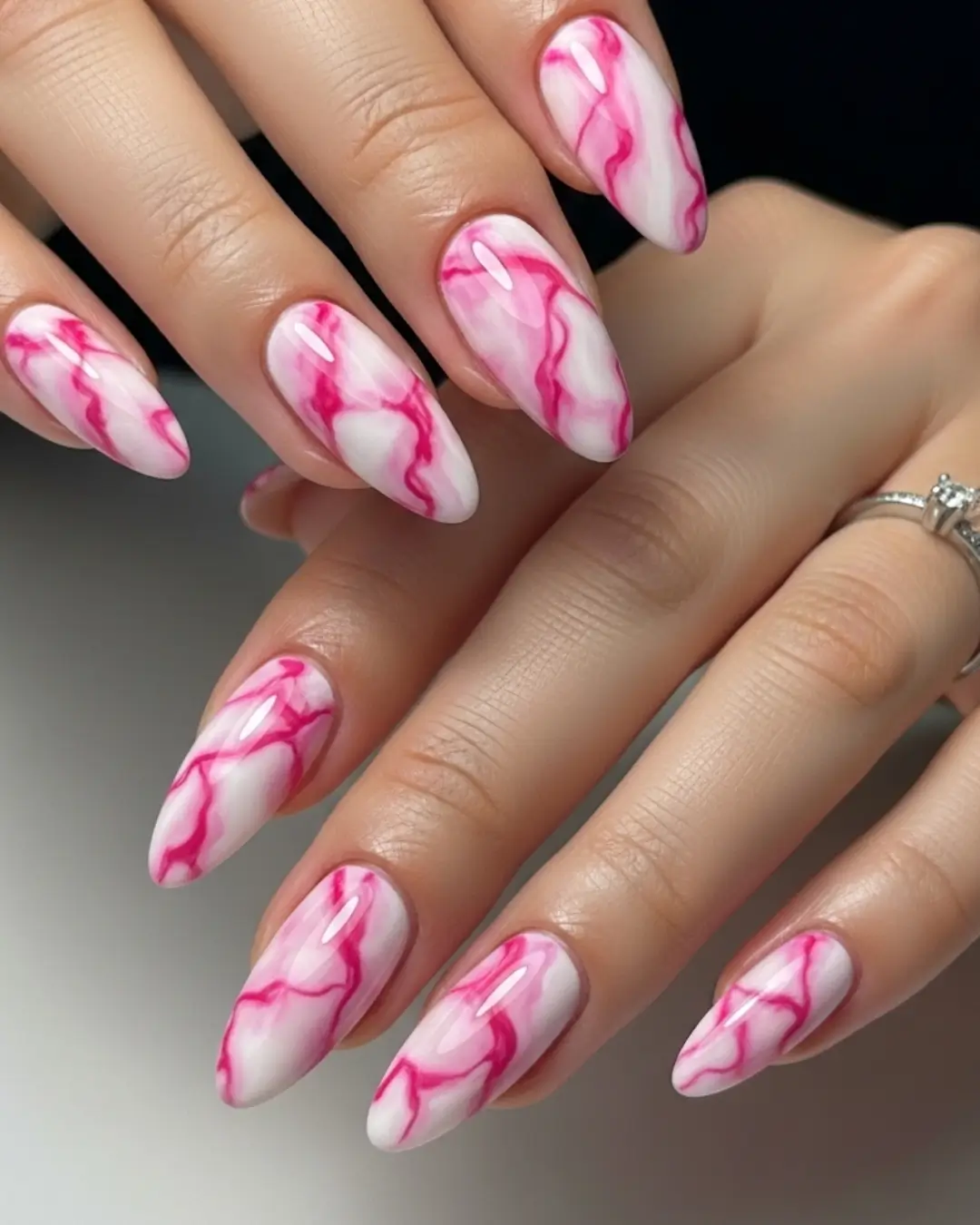 Pink and White Marble Almond Nails