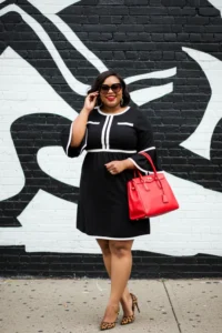 Chic Black Dress with White Trim